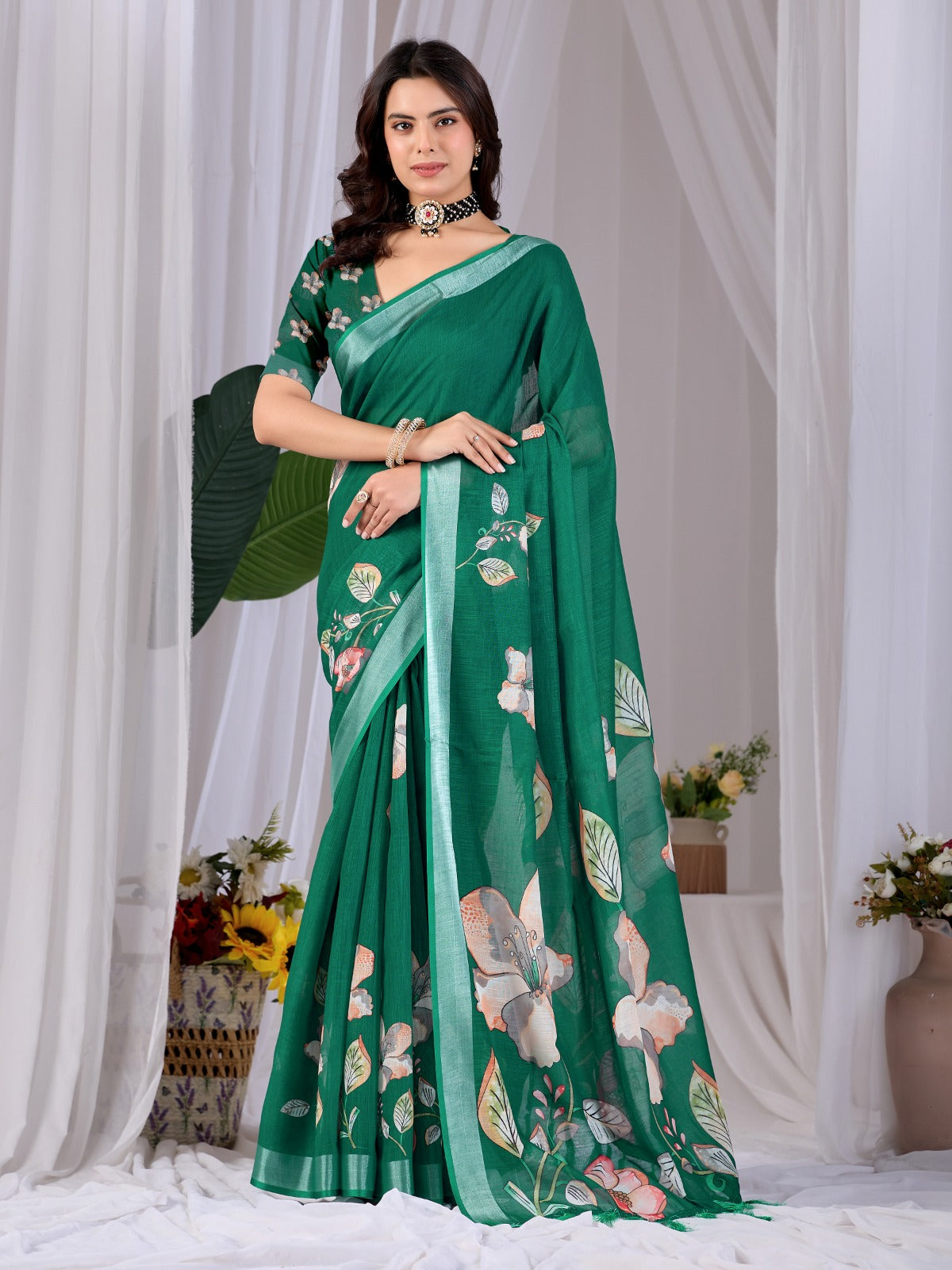 Elegant Emerald Green Festive Saree with Soft Peach and White Floral Accents and Pallu Tassels