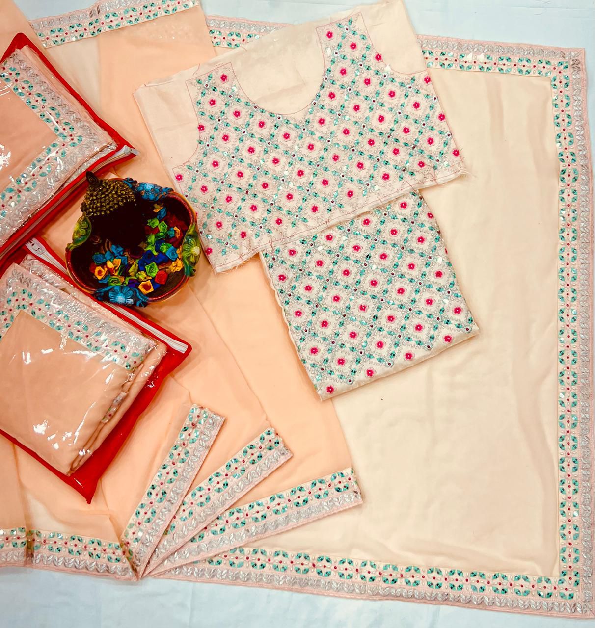 Peach and Gold Georgette Saree with Mirror-Work Embellishments and Matching Fabric Belt