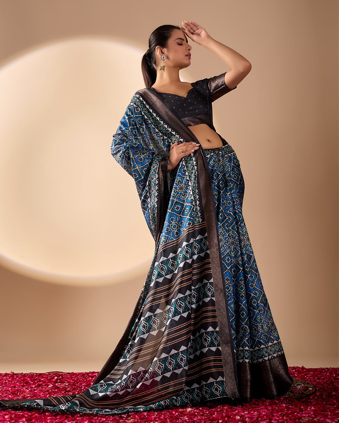 Premium Heritage Patola-Inspired Blue Festive Saree with Detailed Geometric Ikkat Patterns and Fringe Tassels