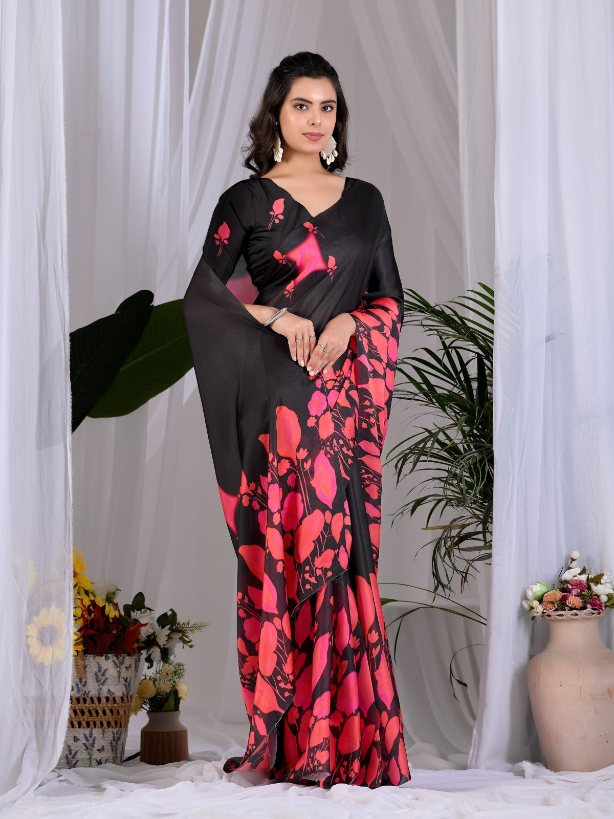 Contemporary Jet Black Festive Saree with Contrast Pink and Coral Floral Pallu Details