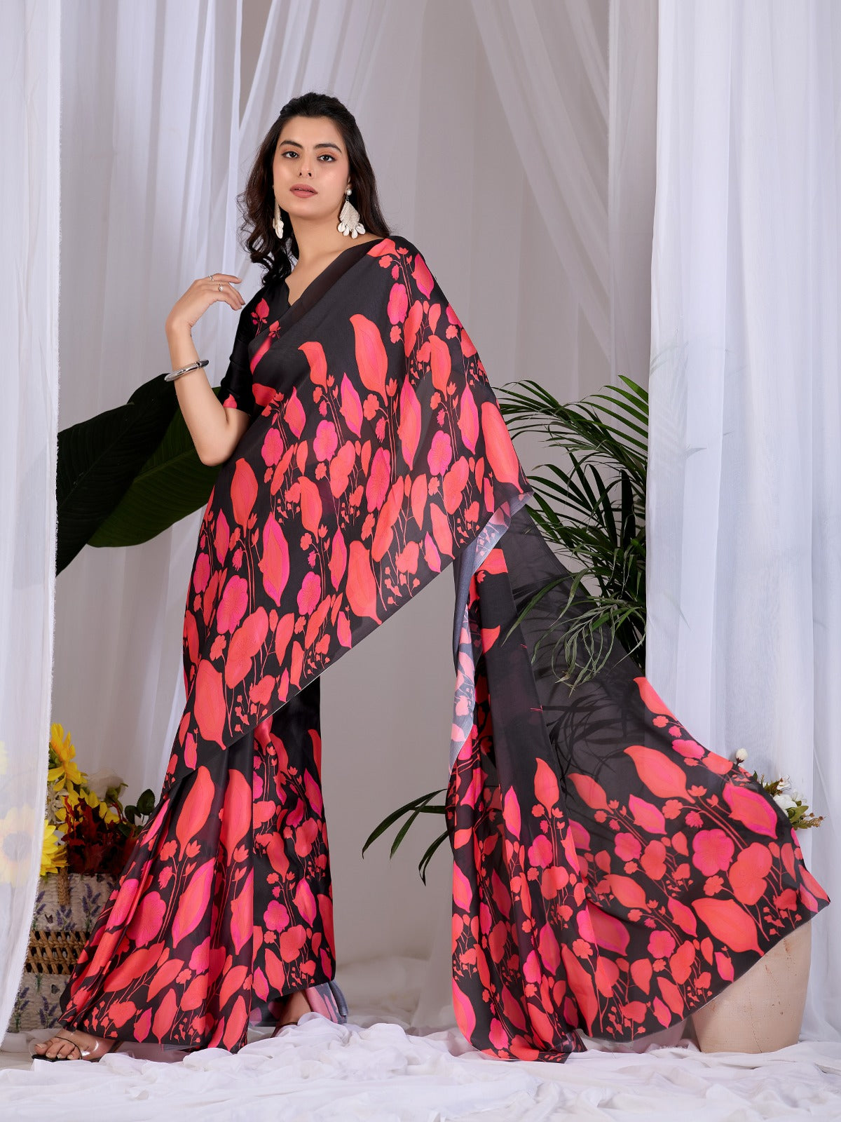 Contemporary Jet Black Festive Saree with Contrast Pink and Coral Floral Pallu Details