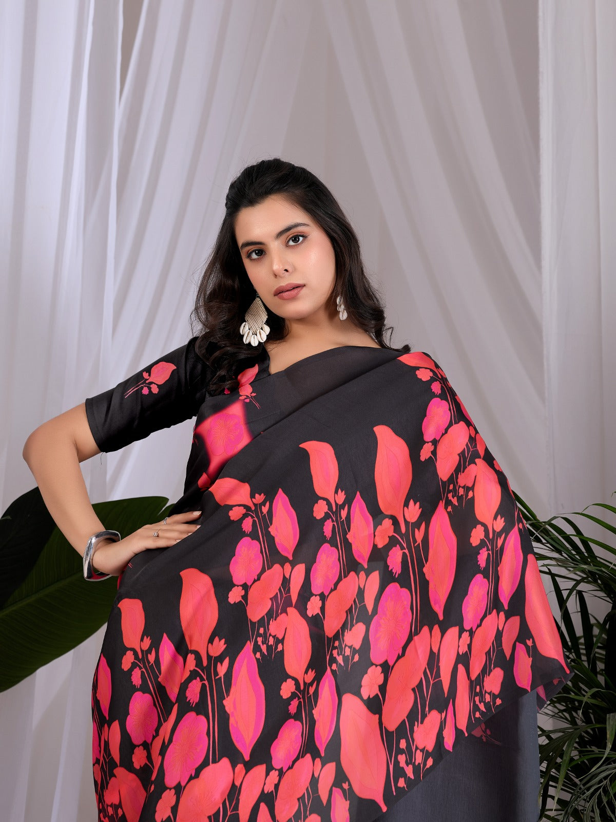 Contemporary Jet Black Festive Saree with Contrast Pink and Coral Floral Pallu Details
