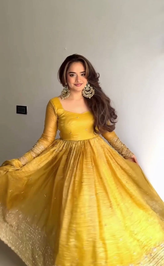 Stunning Mustard Yellow Silk Anarkali Gown with Delicate Mirror Work Embellishments and a Matching Tissue Dupatta Set