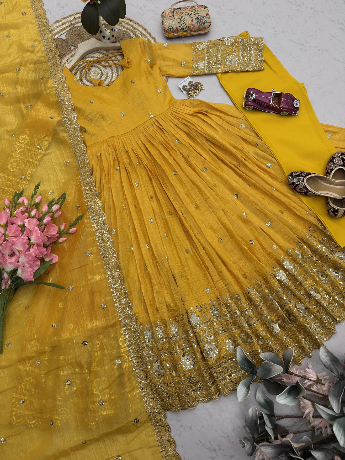 Stunning Mustard Yellow Silk Anarkali Gown with Delicate Mirror Work Embellishments and a Matching Tissue Dupatta Set