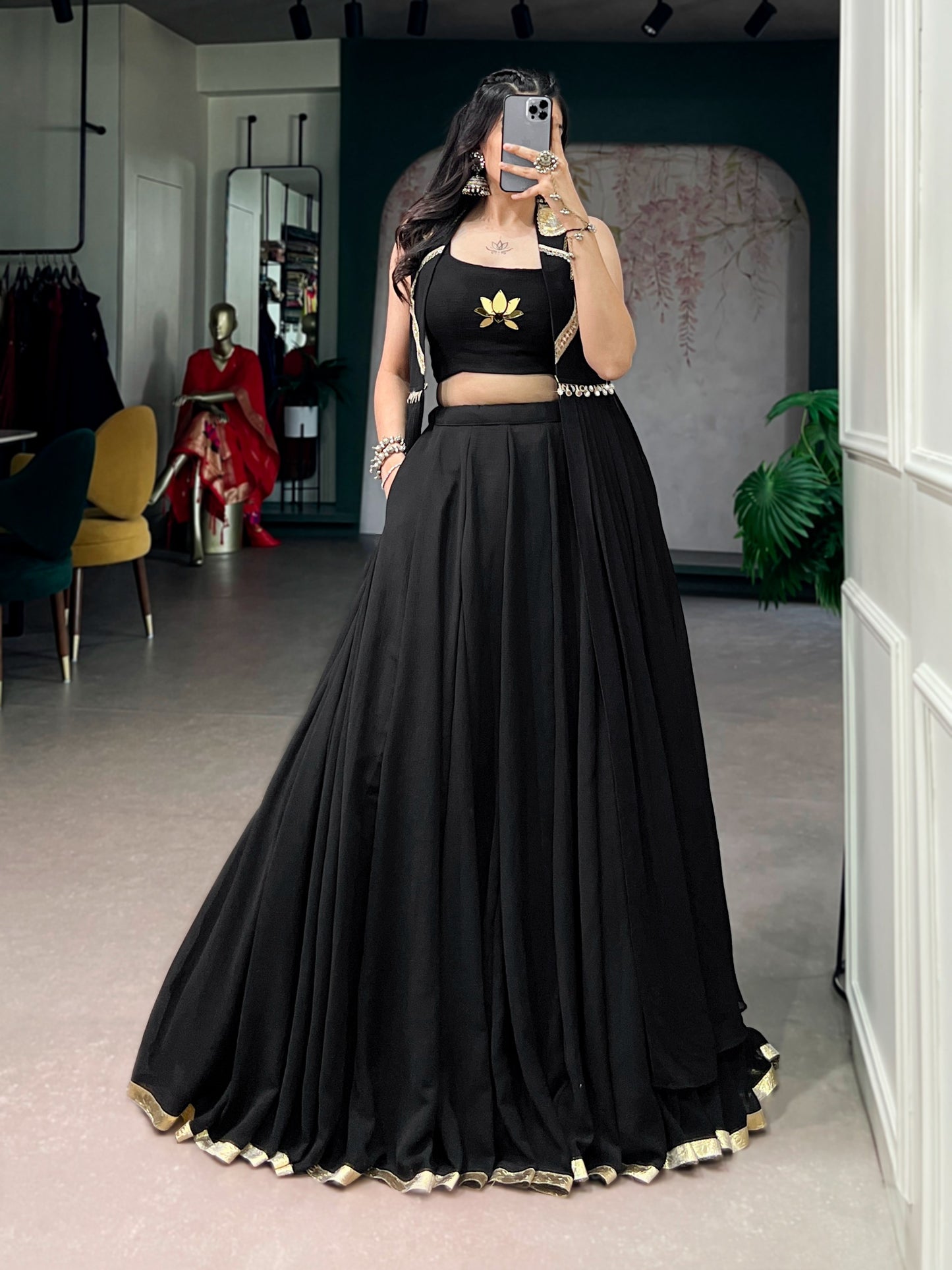 Ready-to-Wear Elegance in a Feather-Light Flow Fabric with Lotus Handwork & a Graceful Long Jacket.