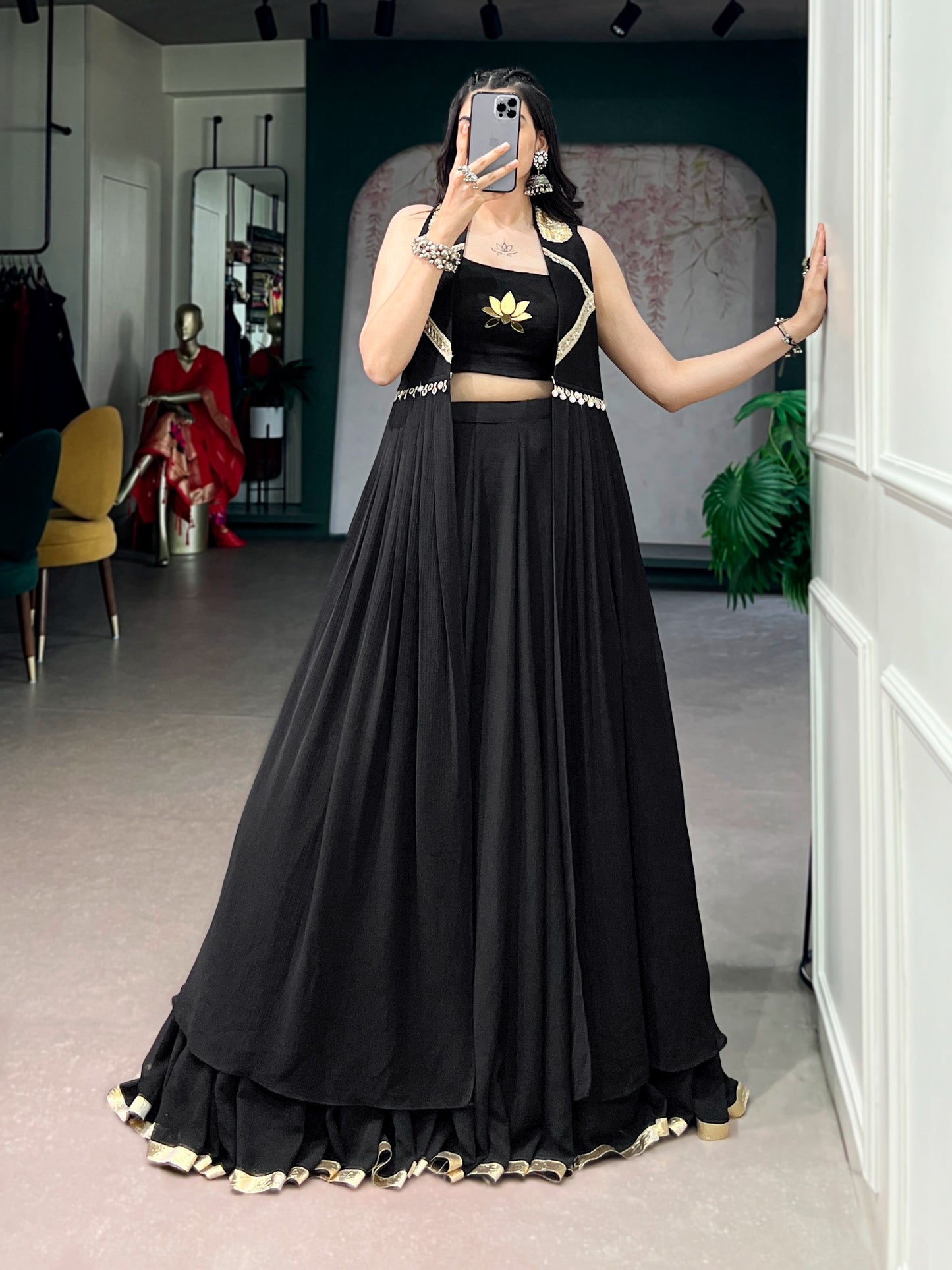 Ready-to-Wear Elegance in a Feather-Light Flow Fabric with Lotus Handwork & a Graceful Long Jacket.
