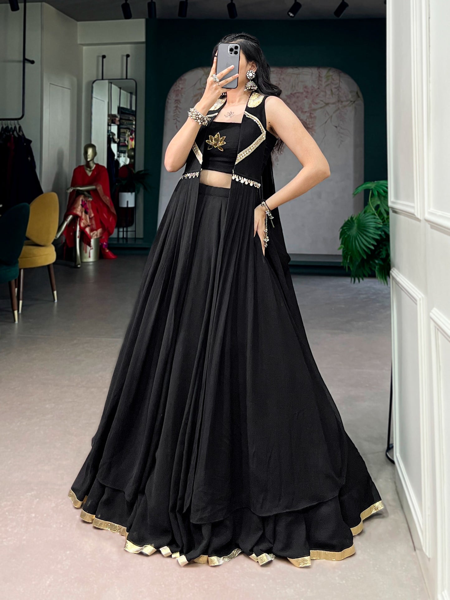 Ready-to-Wear Elegance in a Feather-Light Flow Fabric with Lotus Handwork & a Graceful Long Jacket.