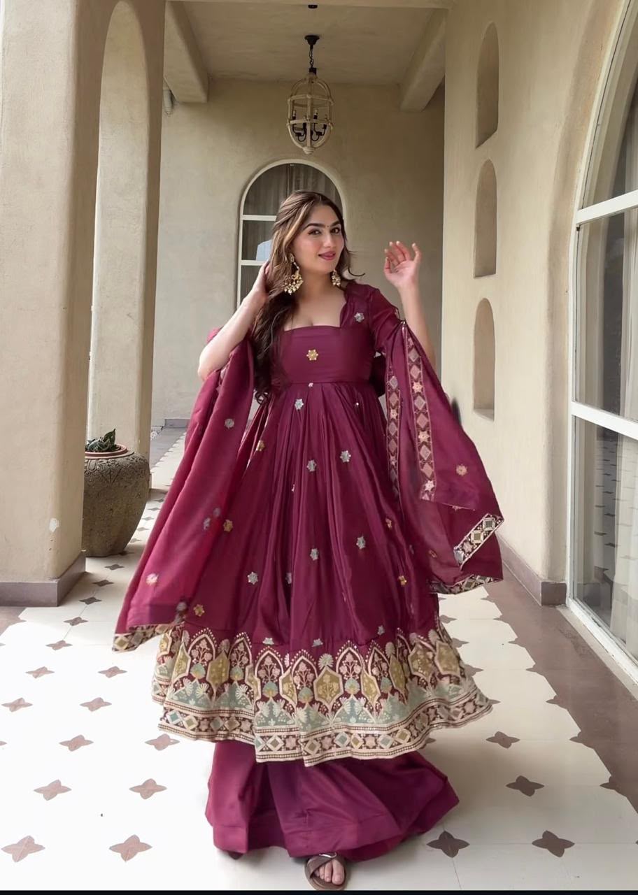 A Contemporary Interpretation of Traditional Royal Anarkali Silhouettes Against Minimalist Arched Architecture