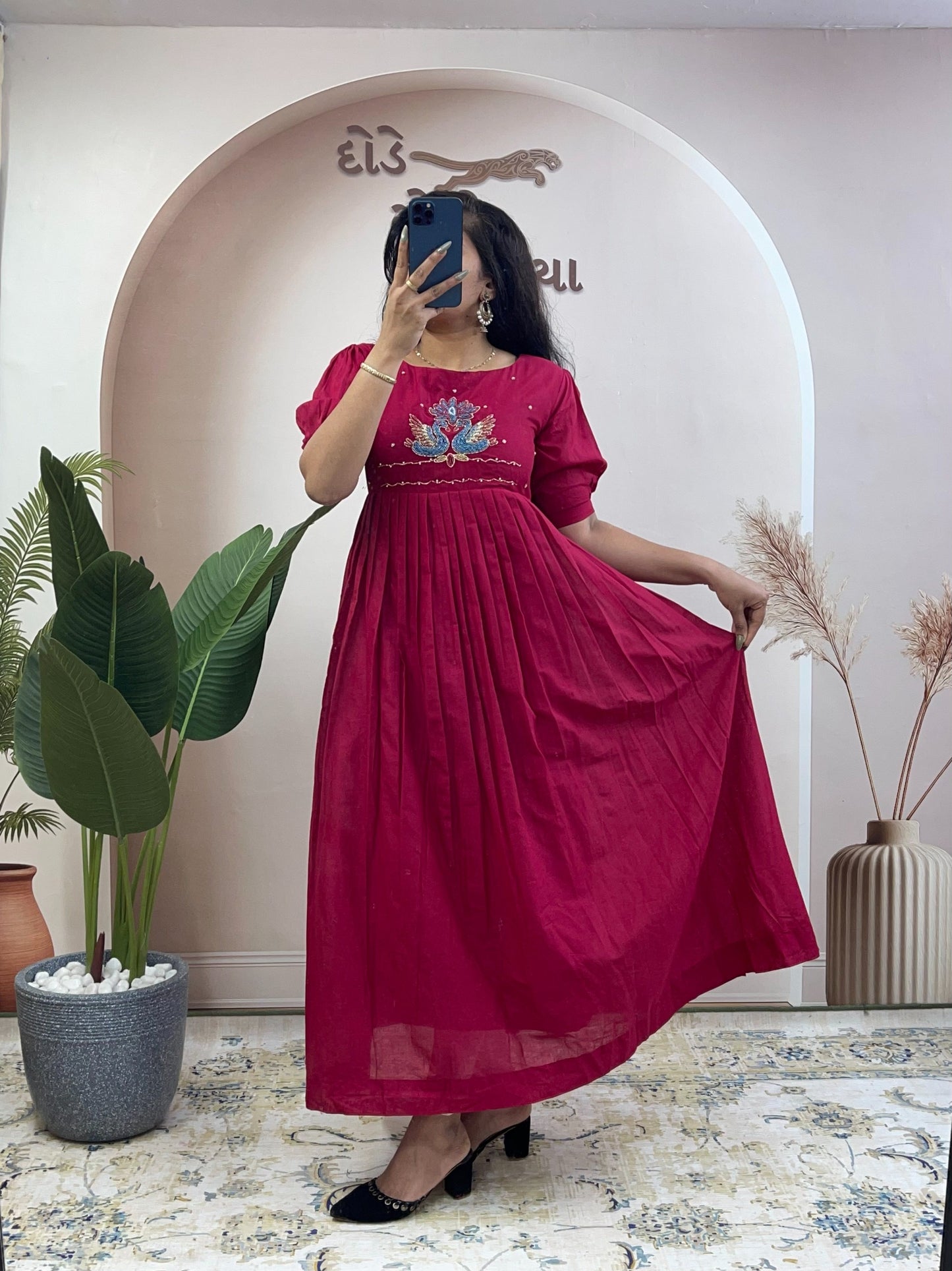 Elegant Cotton Flared Anarkali Maxi Dress with Intricate Peacock Hand Embroidery and Puff Sleeves .