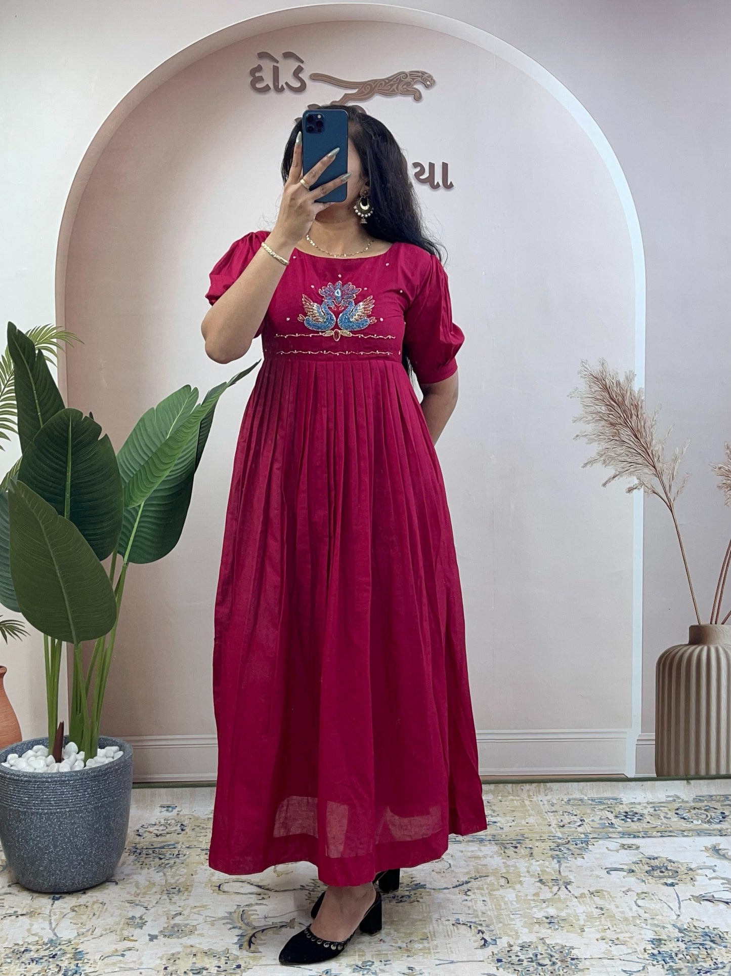 Elegant Cotton Flared Anarkali Maxi Dress with Intricate Peacock Hand Embroidery and Puff Sleeves .