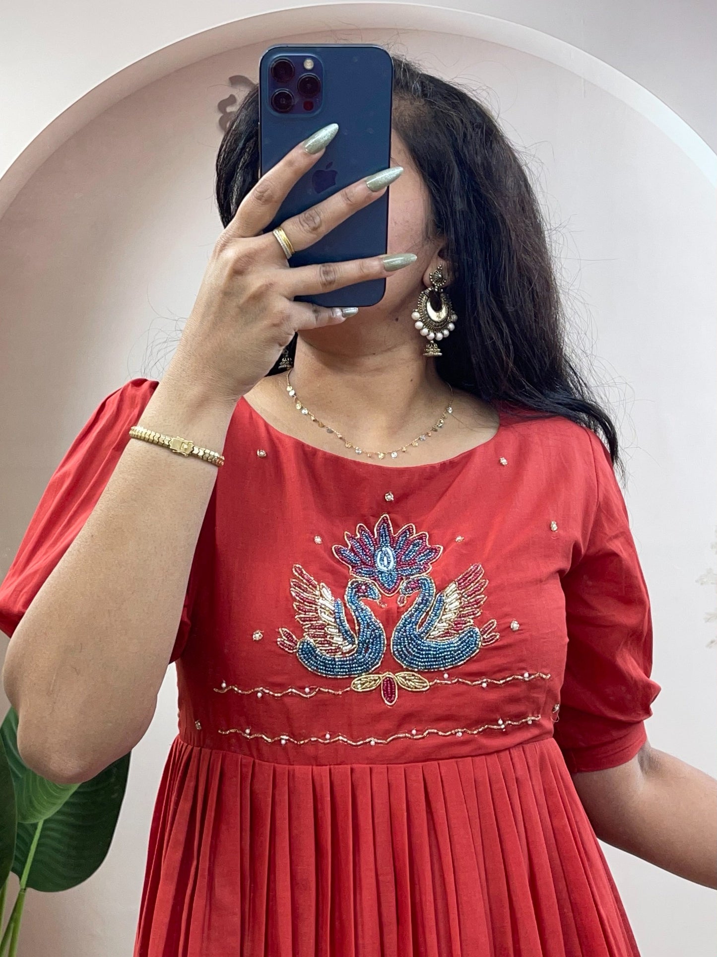 Elegant Cotton Flared Anarkali Maxi Dress with Intricate Peacock Hand Embroidery and Puff Sleeves .