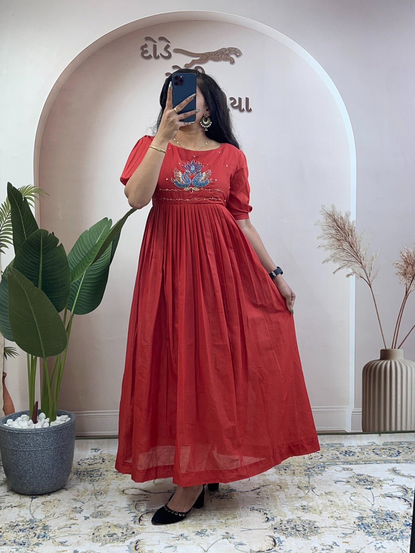 Elegant Cotton Flared Anarkali Maxi Dress with Intricate Peacock Hand Embroidery and Puff Sleeves .