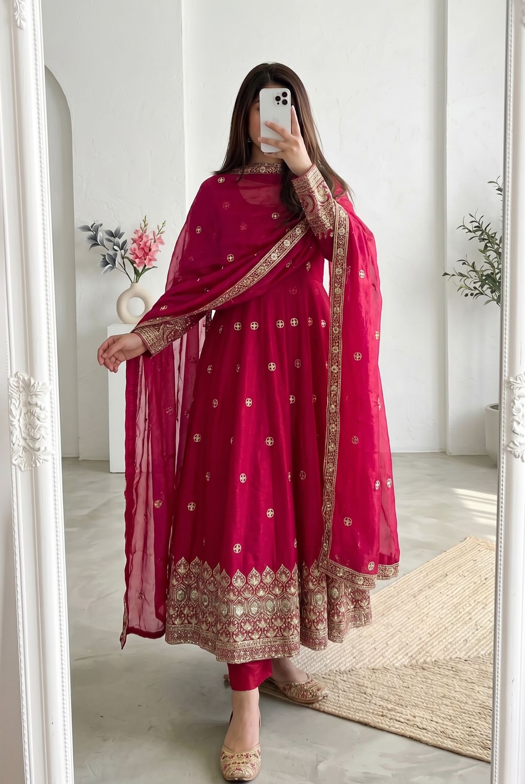 Four-Part Color Series of a Model Wearing a Flared Organza Anarkali Gown with Traditional Gold Medallion Motifs and Scalloped Border Work