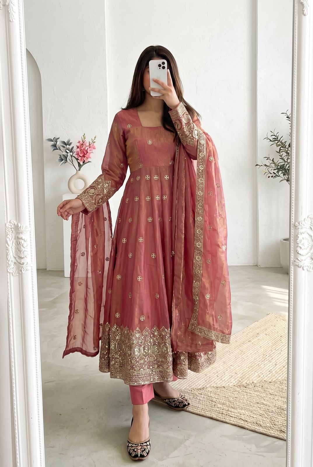 Four-Part Color Series of a Model Wearing a Flared Organza Anarkali Gown with Traditional Gold Medallion Motifs and Scalloped Border Work
