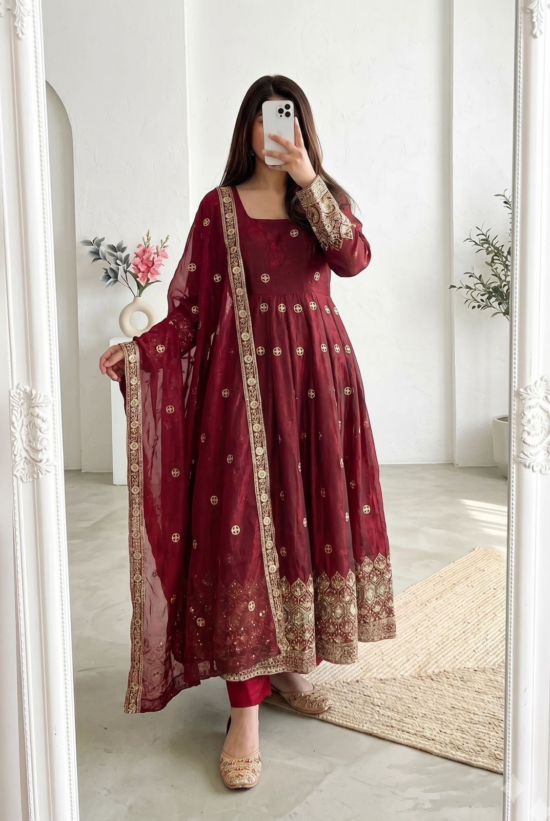 Four-Part Color Series of a Model Wearing a Flared Organza Anarkali Gown with Traditional Gold Medallion Motifs and Scalloped Border Work