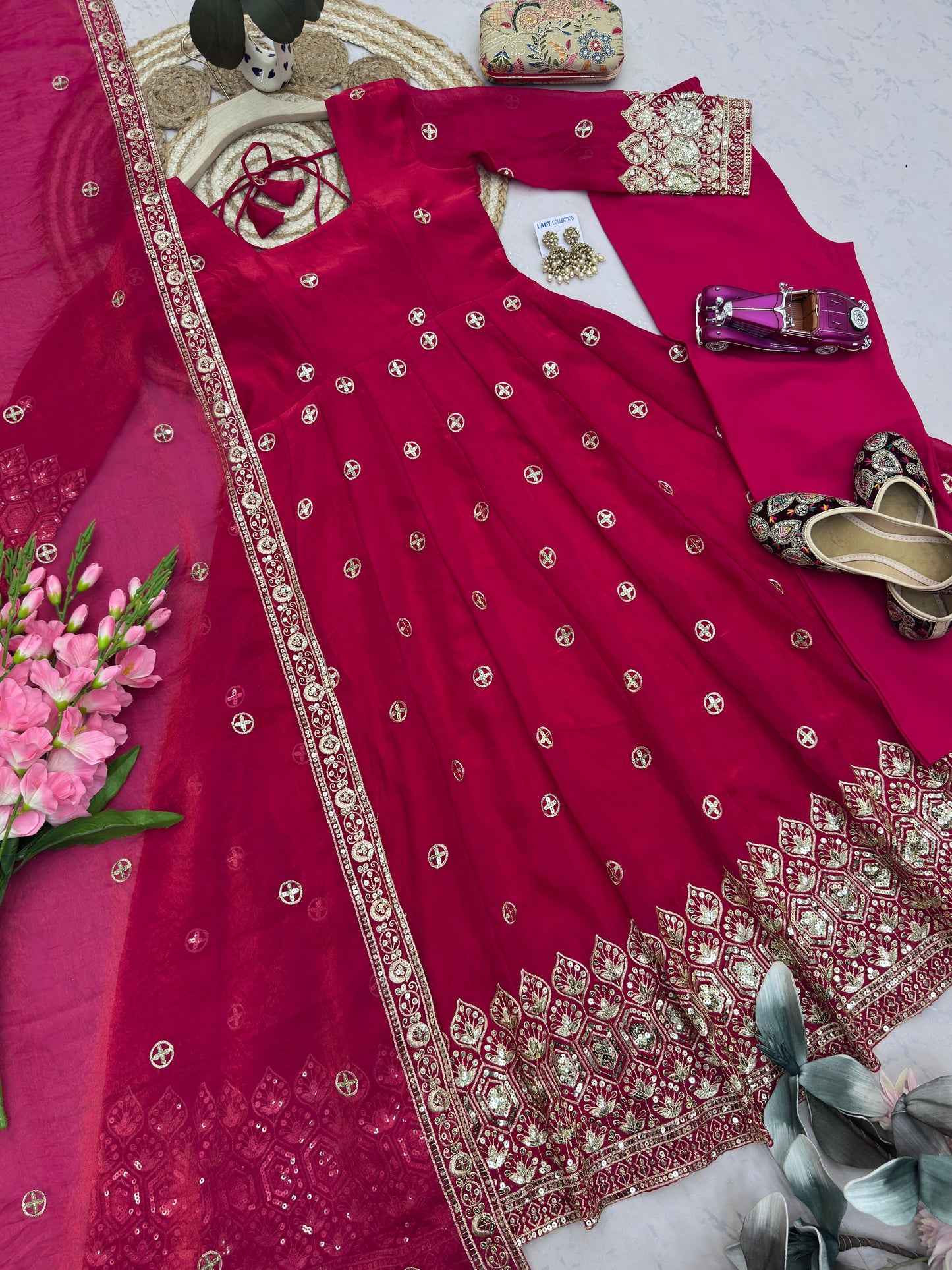 Four-Part Color Series of a Model Wearing a Flared Organza Anarkali Gown with Traditional Gold Medallion Motifs and Scalloped Border Work