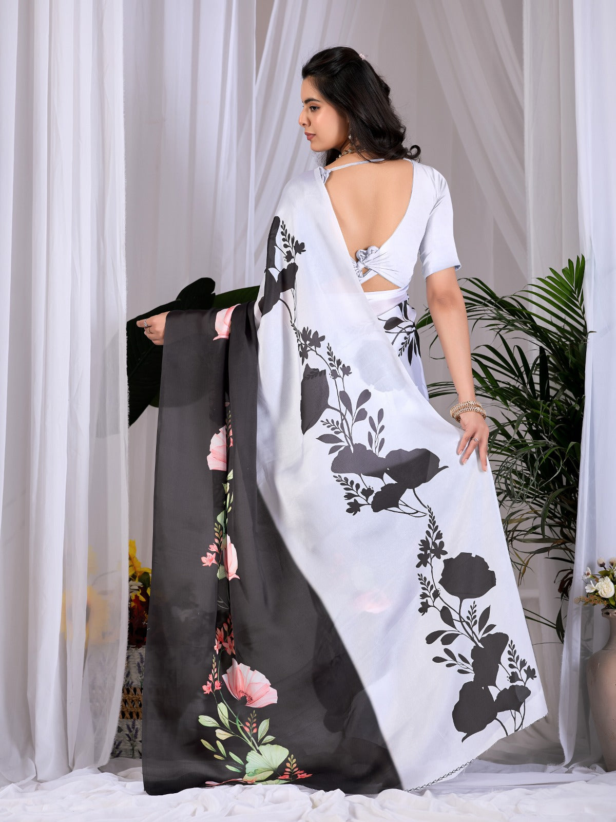 The Drama of Contrast: Framing Bold Black-and-White Silk Block Patterns with Delicate Coral Floral Clusters