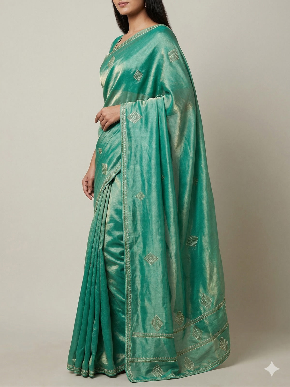 A Study in Minimalist Studio Lighting and Timeless Saree Drapes