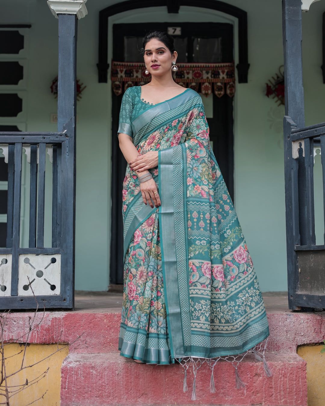Ornate Teal Green Floral Digital Print Saree with Wide Silver Zari Border, Intricate Kalamkari-Style Pallu, and Matching Self-Weave Blouse