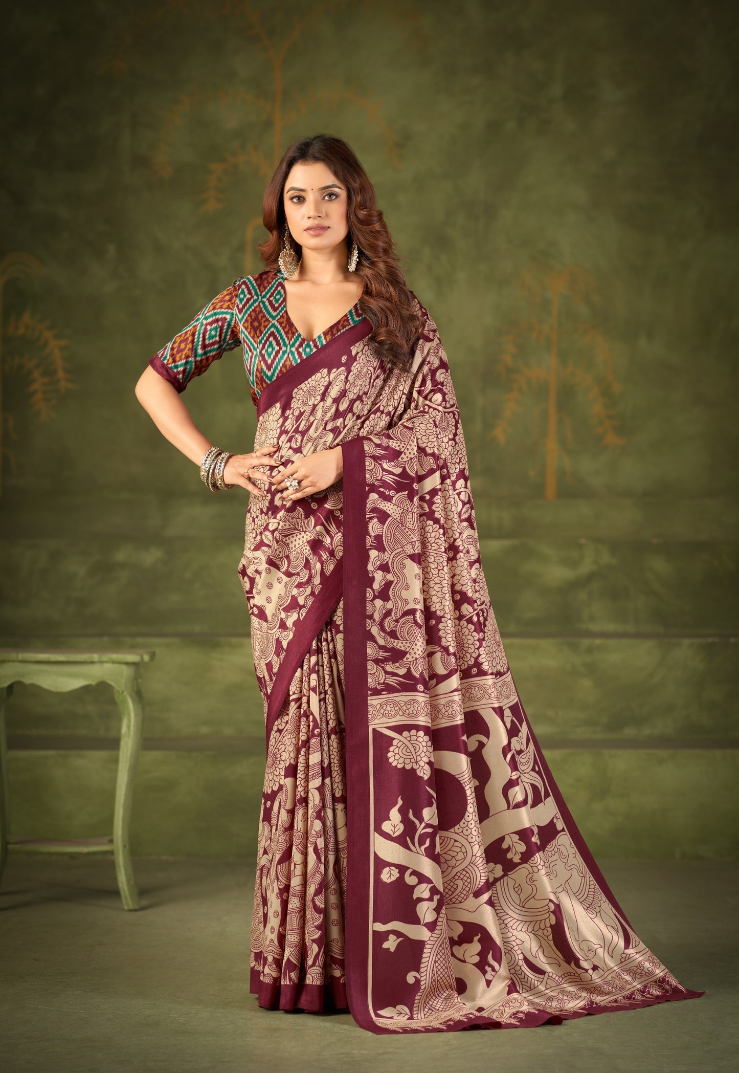 Experience the beauty of traditional Kalamkari prints on luxurious Tasar Silk, enhanced with a unique Ikkat print blouse for a sophisticated look ✨