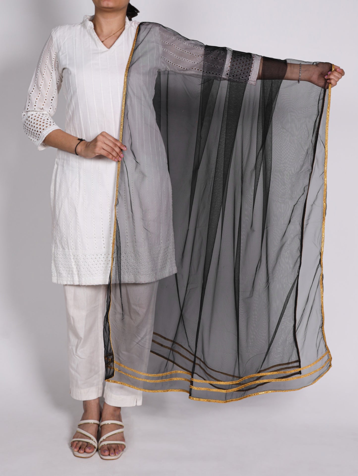 Grace enhanced with a delicate net dupatta. 💫