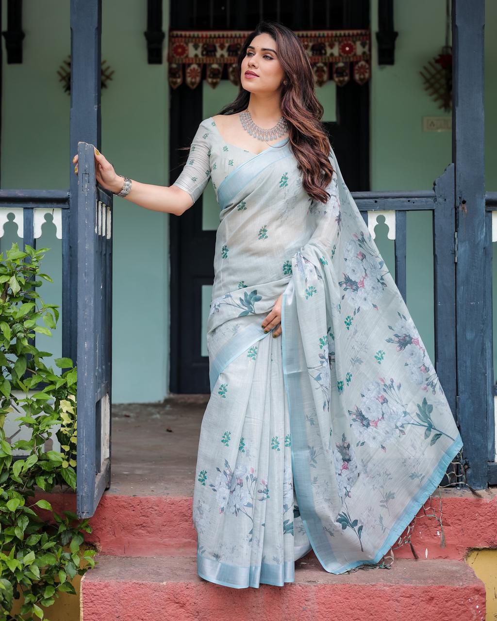 A Minimalist Pastel Mint Saree Paired with a Crystal Choker and Statement Silver Cuff for an Effortless Day Look