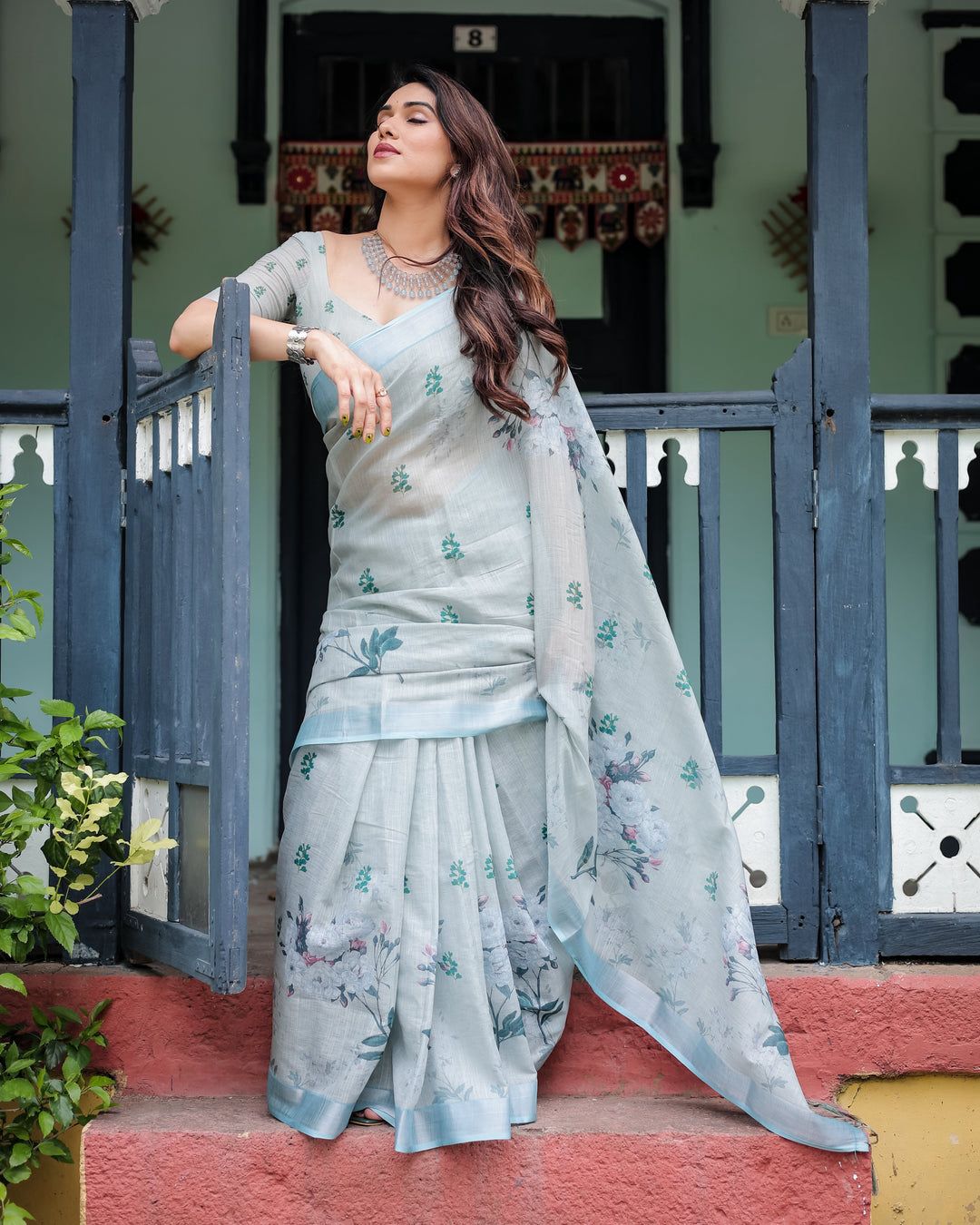 A Minimalist Pastel Mint Saree Paired with a Crystal Choker and Statement Silver Cuff for an Effortless Day Look