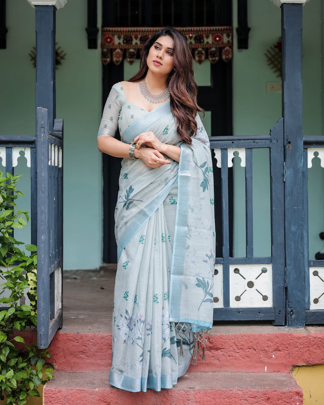 A Minimalist Pastel Mint Saree Paired with a Crystal Choker and Statement Silver Cuff for an Effortless Day Look