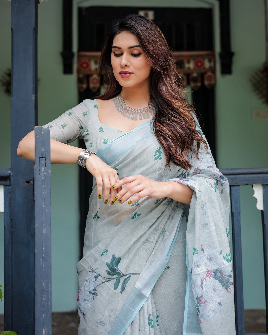 A Minimalist Pastel Mint Saree Paired with a Crystal Choker and Statement Silver Cuff for an Effortless Day Look
