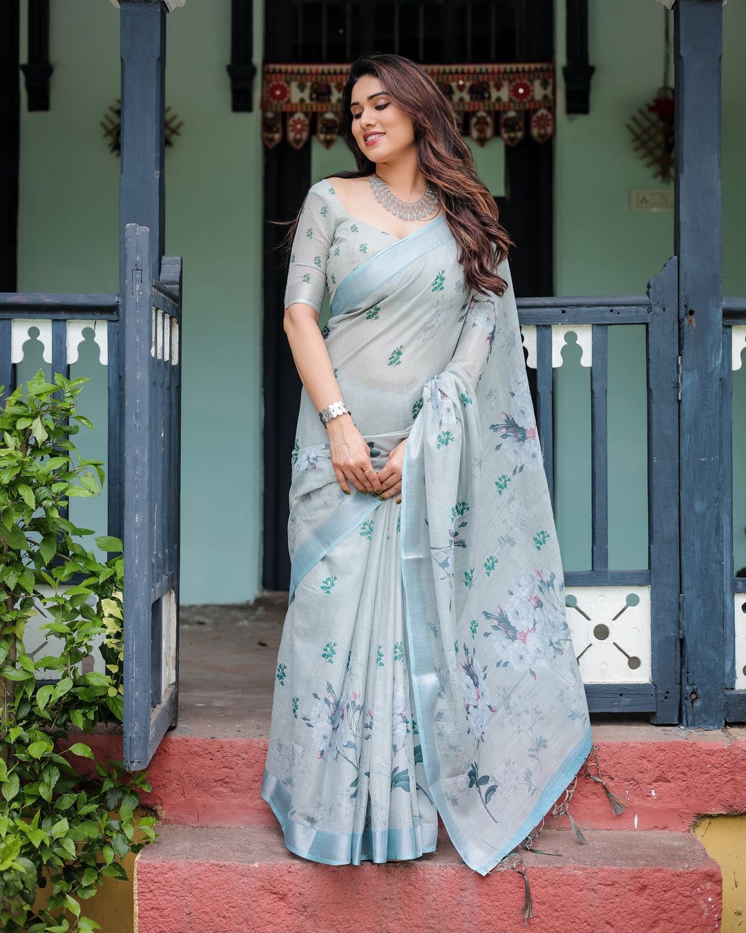A Minimalist Pastel Mint Saree Paired with a Crystal Choker and Statement Silver Cuff for an Effortless Day Look