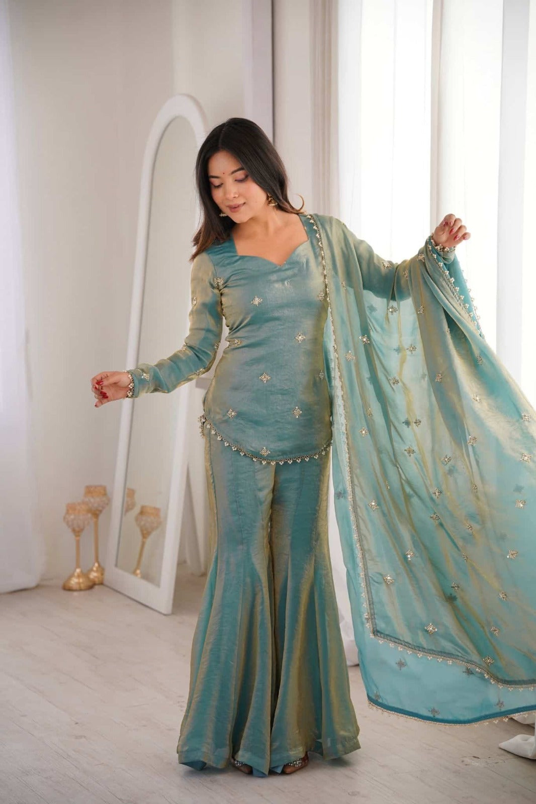 Elegant Sea Green Dual-Tone Silk Sharara Suit Set featuring a Short Sweetheart-Neck Kurti with Delicate Booti Embroidery and a Matching Sheer Dupatta