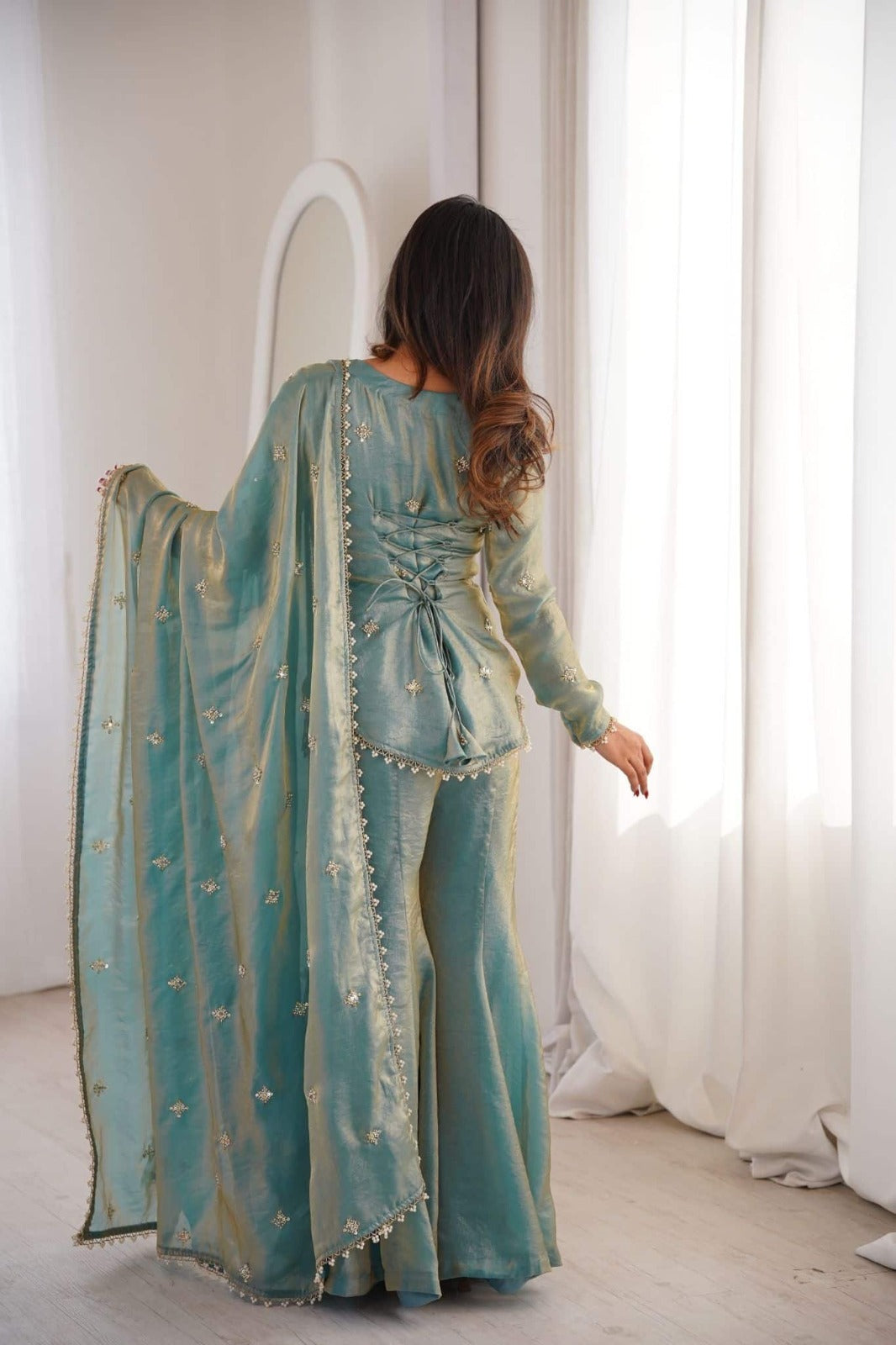 Elegant Sea Green Dual-Tone Silk Sharara Suit Set featuring a Short Sweetheart-Neck Kurti with Delicate Booti Embroidery and a Matching Sheer Dupatta