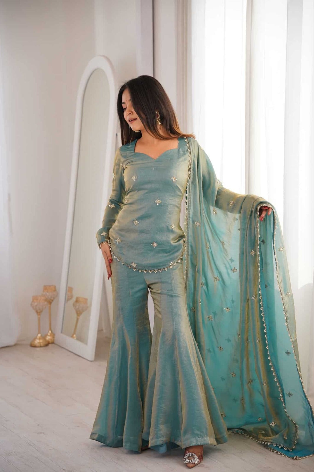 Elegant Sea Green Dual-Tone Silk Sharara Suit Set featuring a Short Sweetheart-Neck Kurti with Delicate Booti Embroidery and a Matching Sheer Dupatta