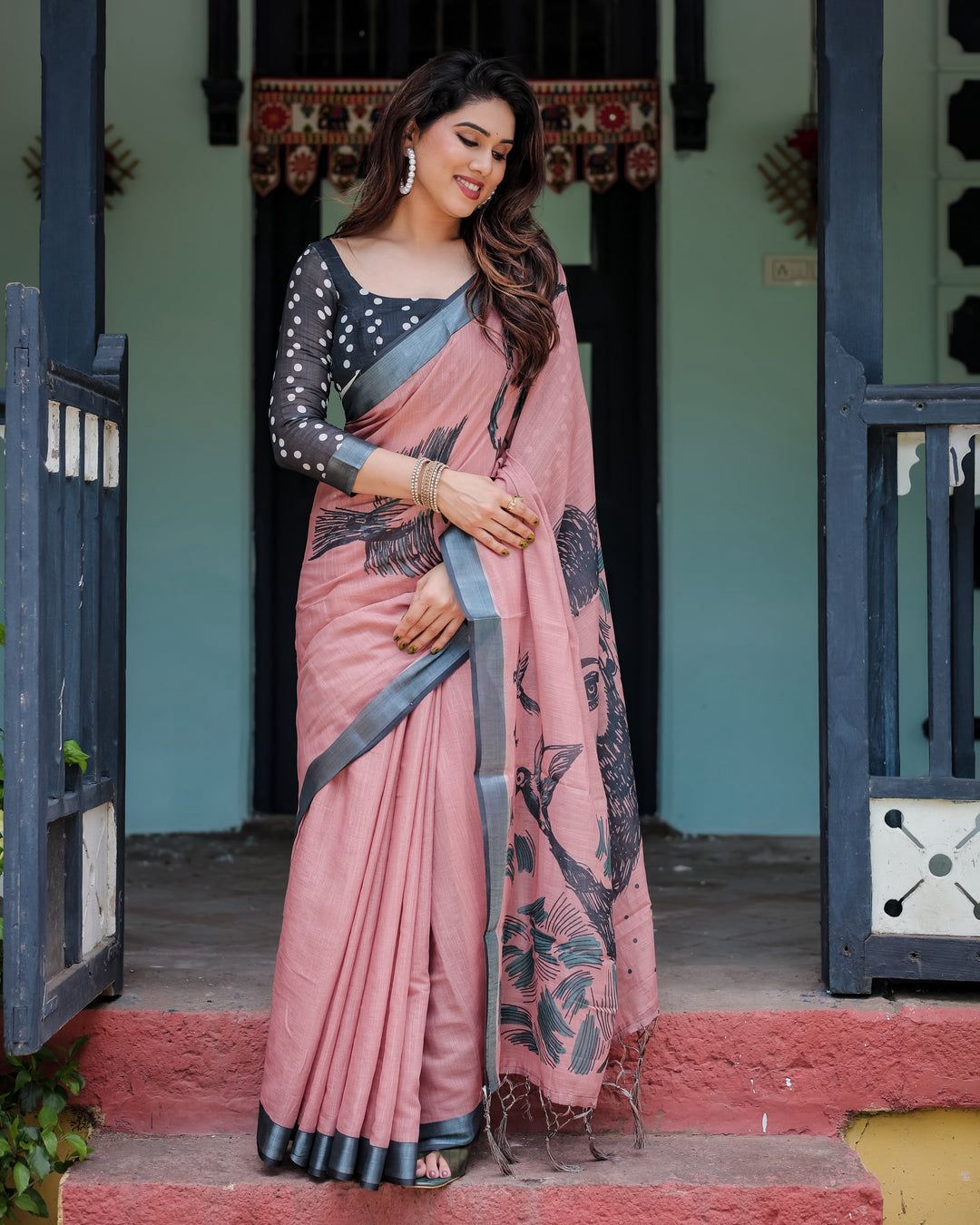 Artistic Salmon Pink Cotton Linen Saree featuring Charcoal Black Bird Sketch Illustrations, a Solid Slate Gray Border, and a Matching Polka-Dotted Blouse