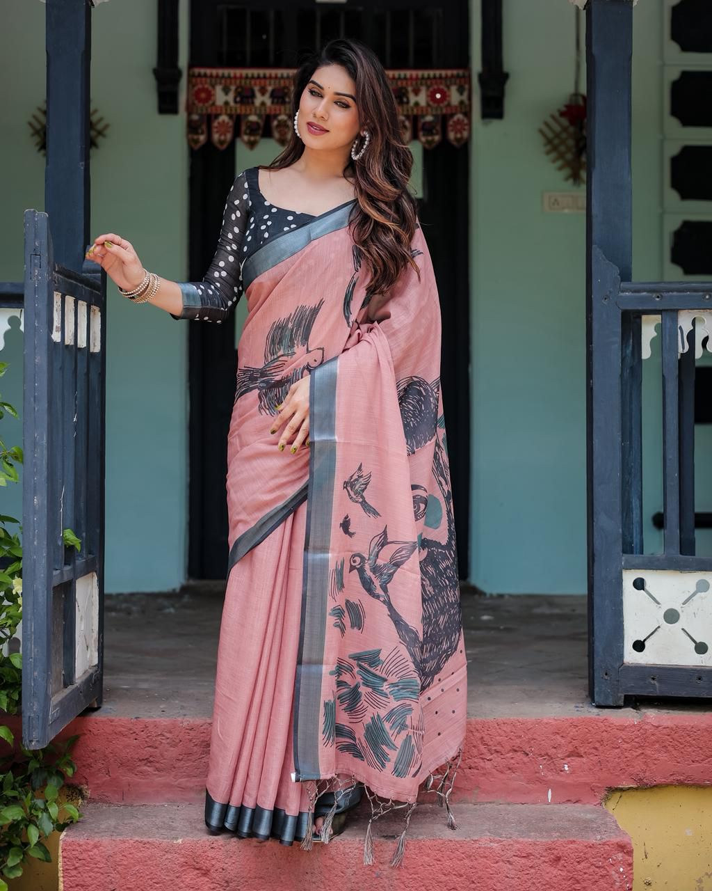 Artistic Salmon Pink Cotton Linen Saree featuring Charcoal Black Bird Sketch Illustrations, a Solid Slate Gray Border, and a Matching Polka-Dotted Blouse