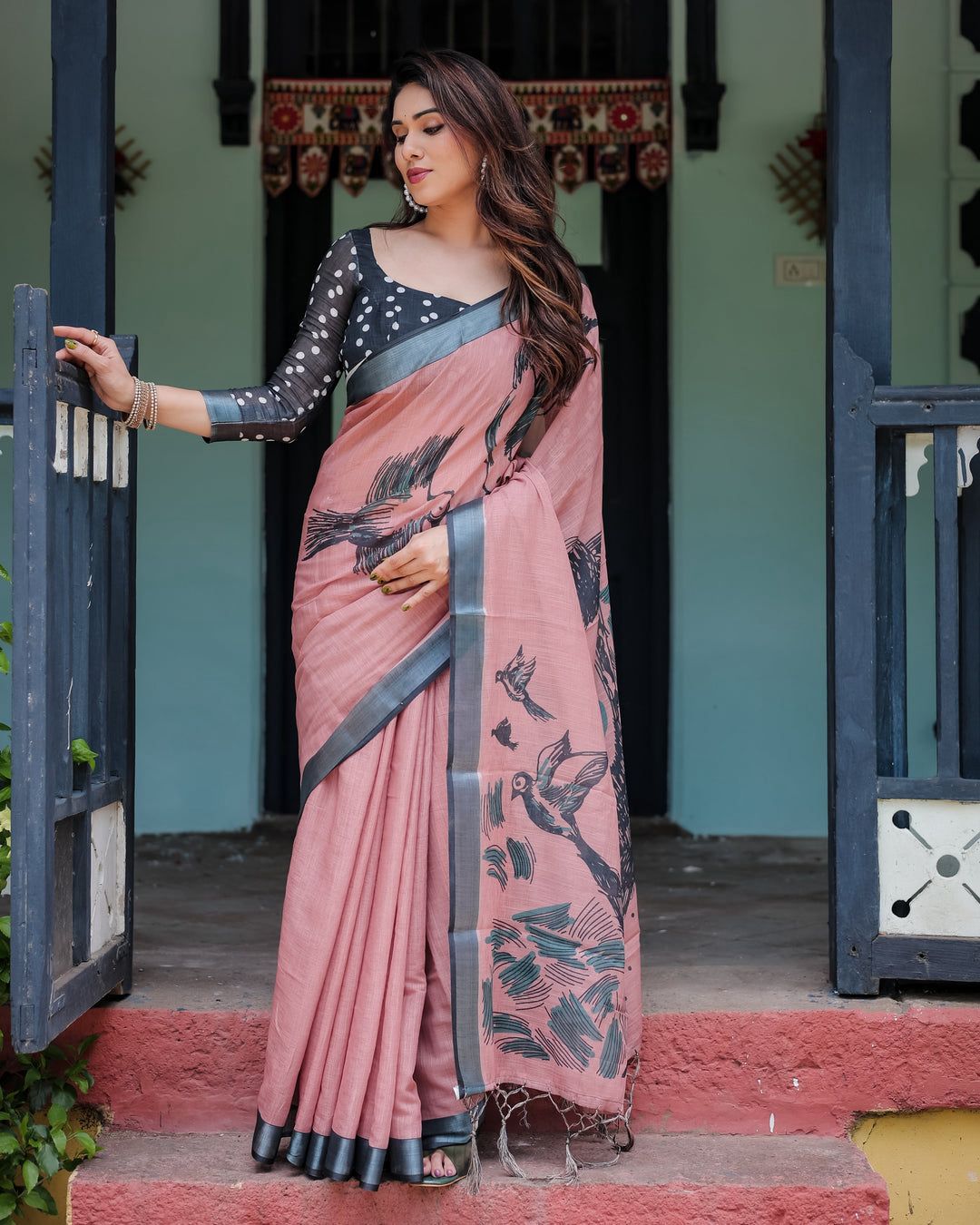 Artistic Salmon Pink Cotton Linen Saree featuring Charcoal Black Bird Sketch Illustrations, a Solid Slate Gray Border, and a Matching Polka-Dotted Blouse