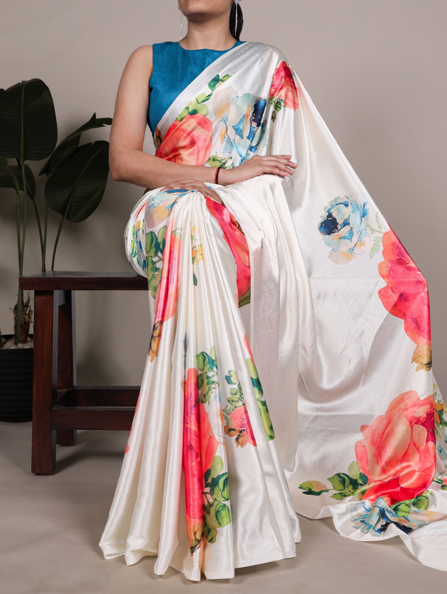 A saree that blends floral charm with satin smoothness 🥀