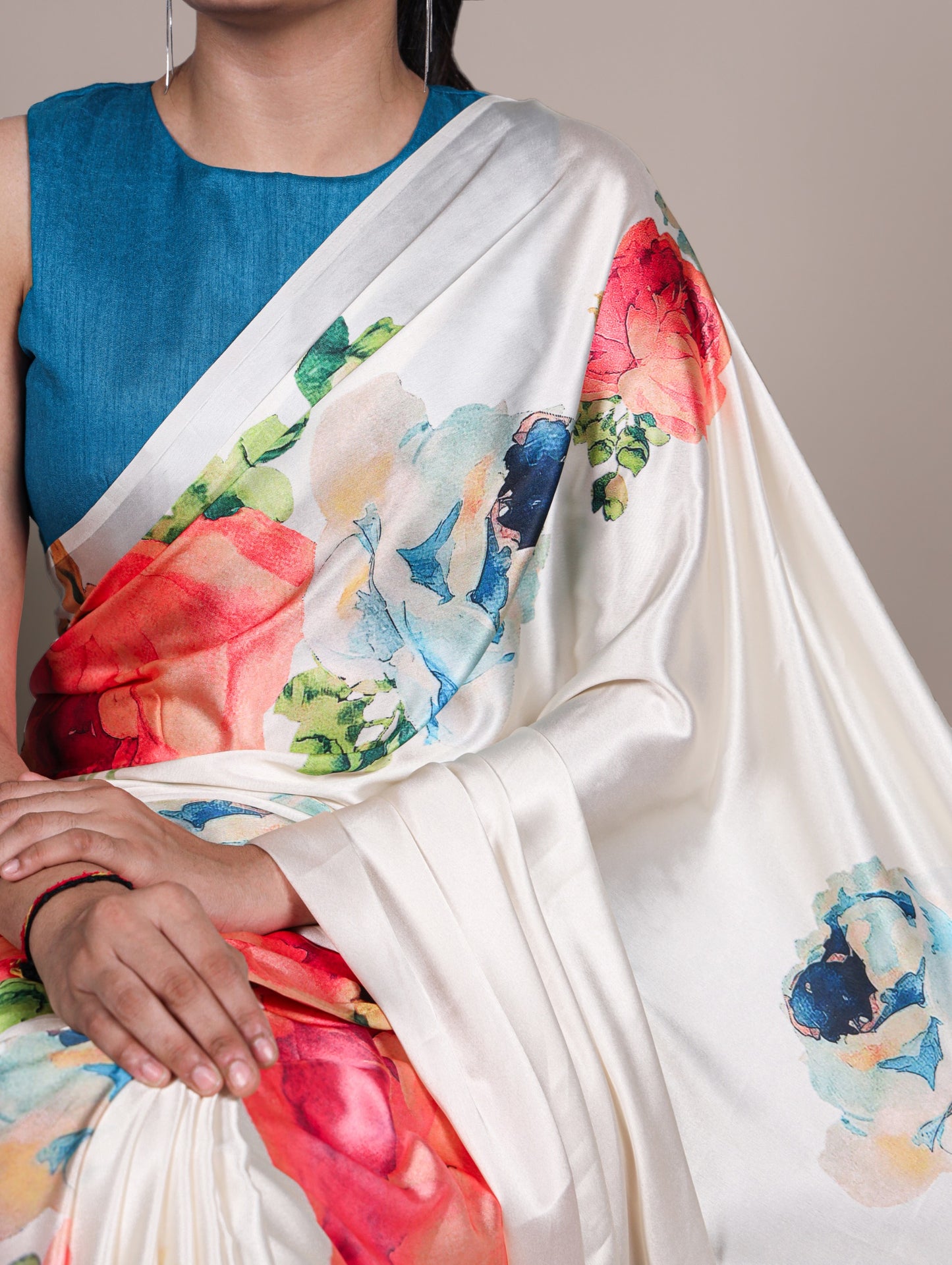 A saree that blends floral charm with satin smoothness 🥀