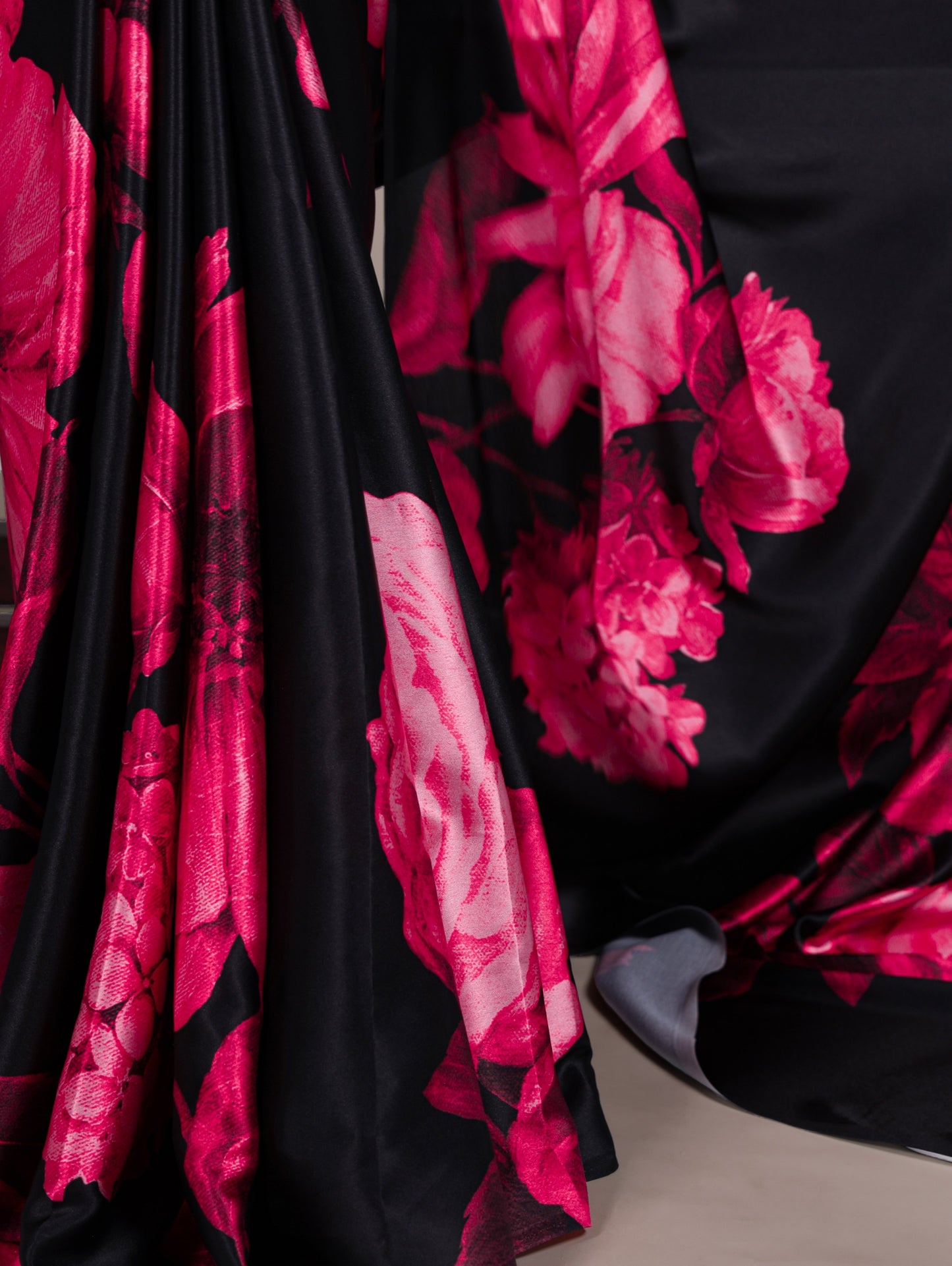 A saree that blends floral charm with satin smoothness 🥀
