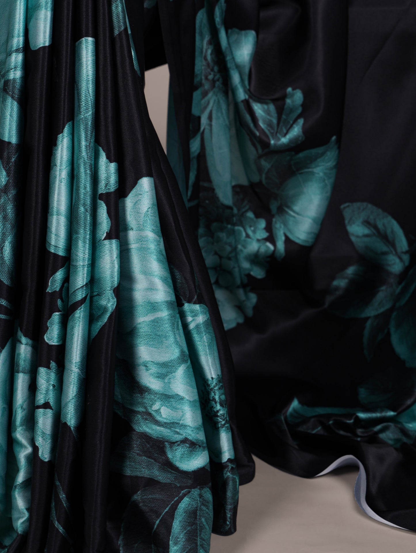 A saree that blends floral charm with satin smoothness 🥀