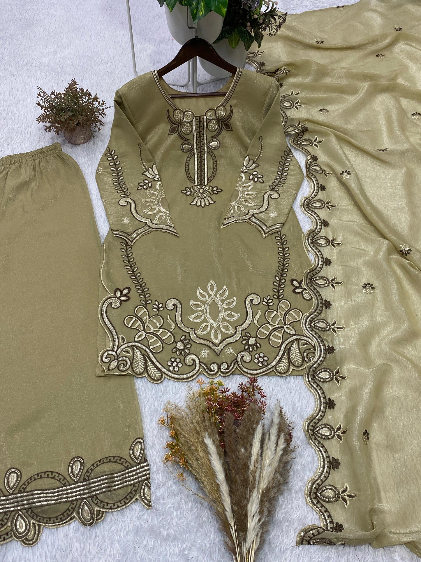 THIS WEDDING SEASON, TRY OUR DESIGNER EMBROIDERED WITH CUT WORKED TOP  PLAZZO SUIT WITH DUPATTA