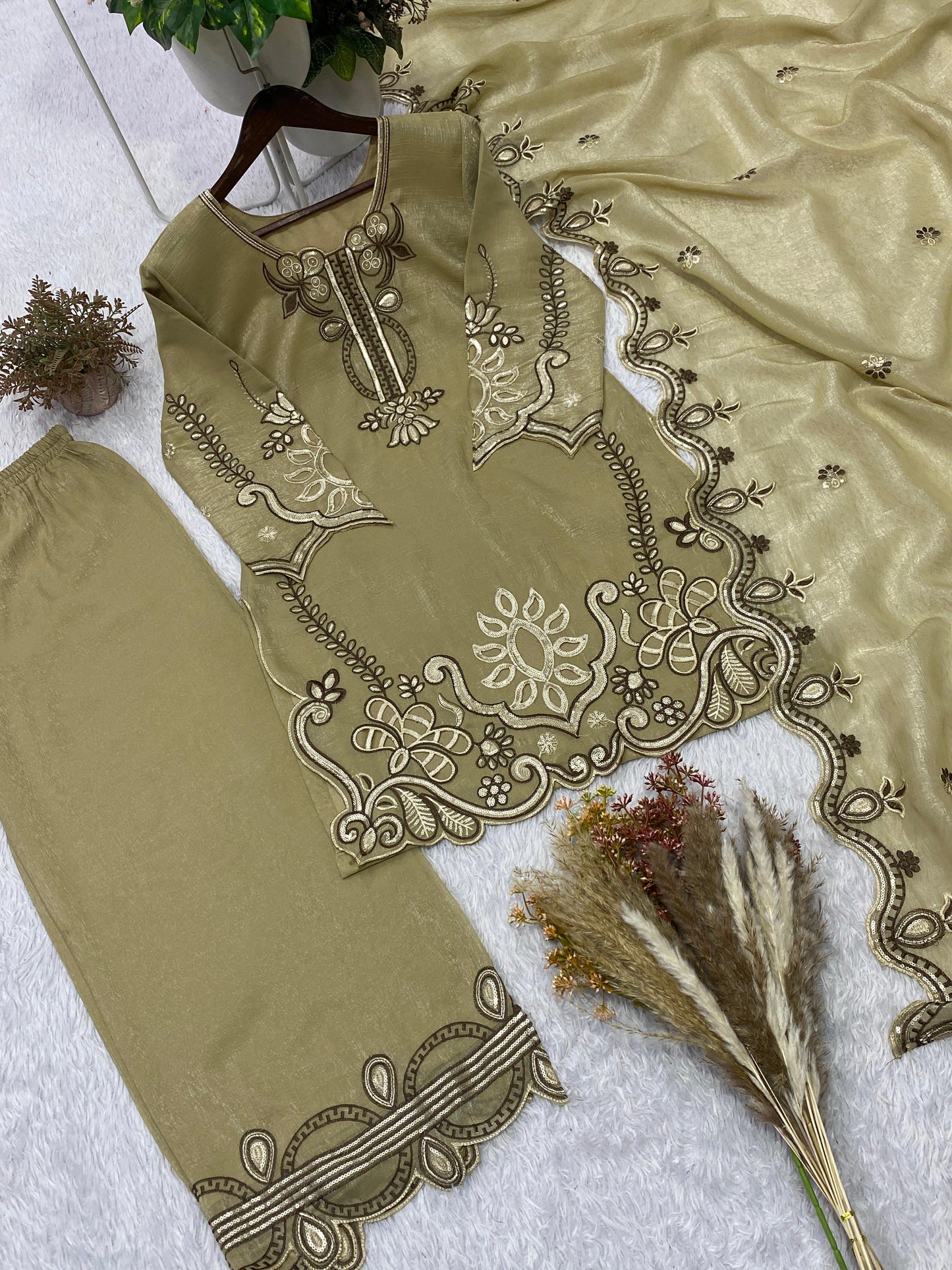 THIS WEDDING SEASON, TRY OUR DESIGNER EMBROIDERED WITH CUT WORKED TOP  PLAZZO SUIT WITH DUPATTA