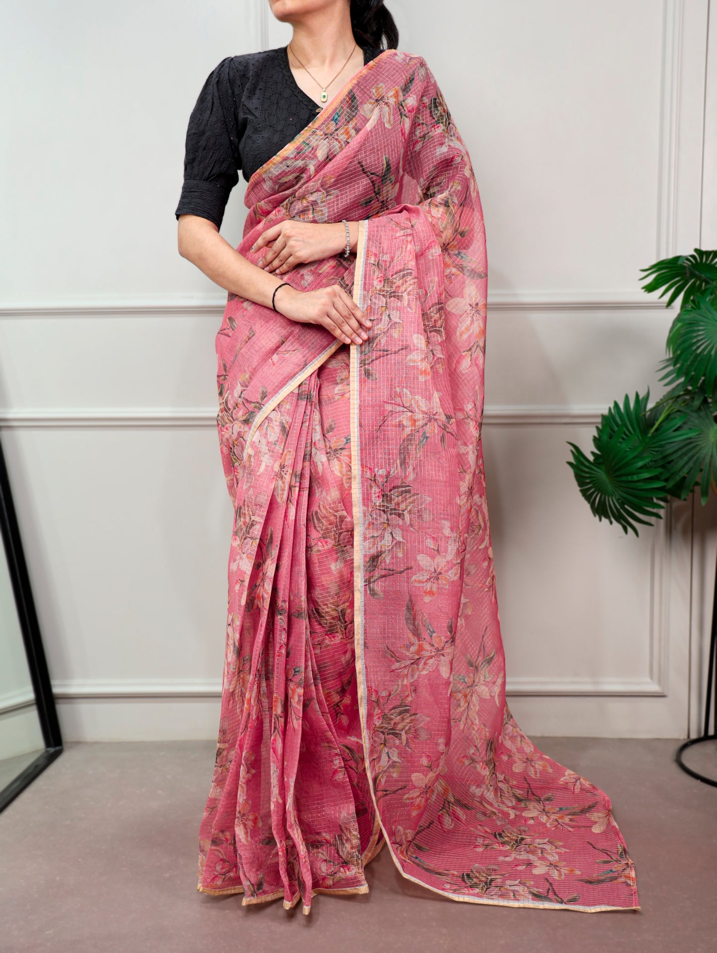 A Kota Doria saree designed to keep you stylish, confident, and graceful wherever you go.