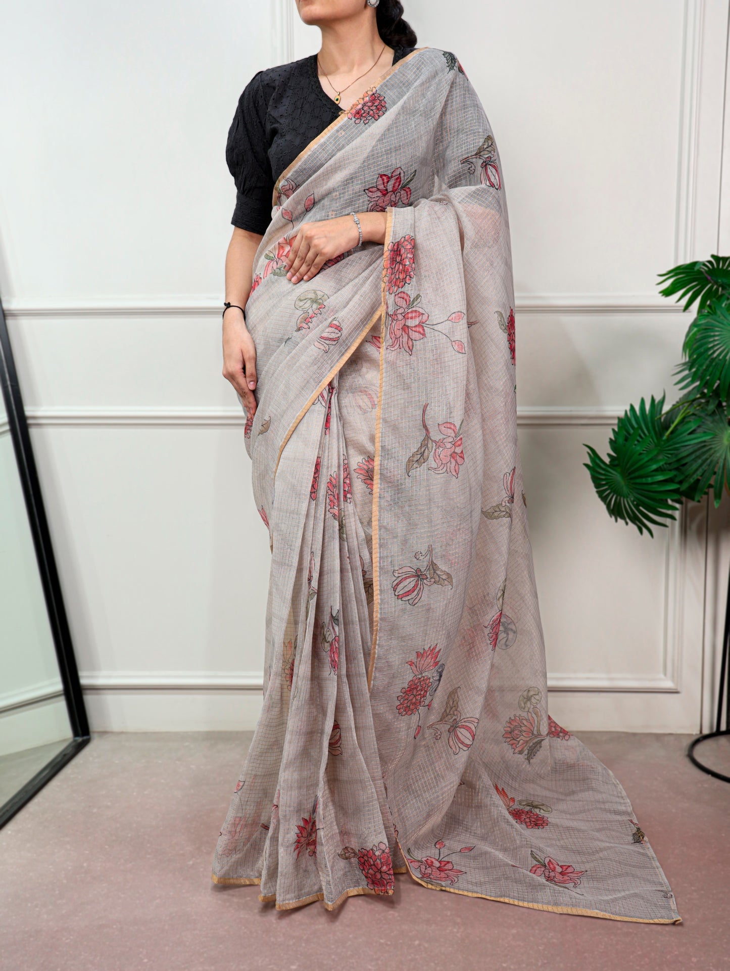 A Kota Doria saree designed to keep you stylish, confident, and graceful wherever you go.
