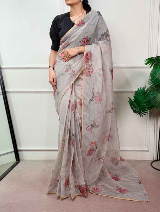 A Kota Doria saree designed to keep you stylish, confident, and graceful wherever you go.