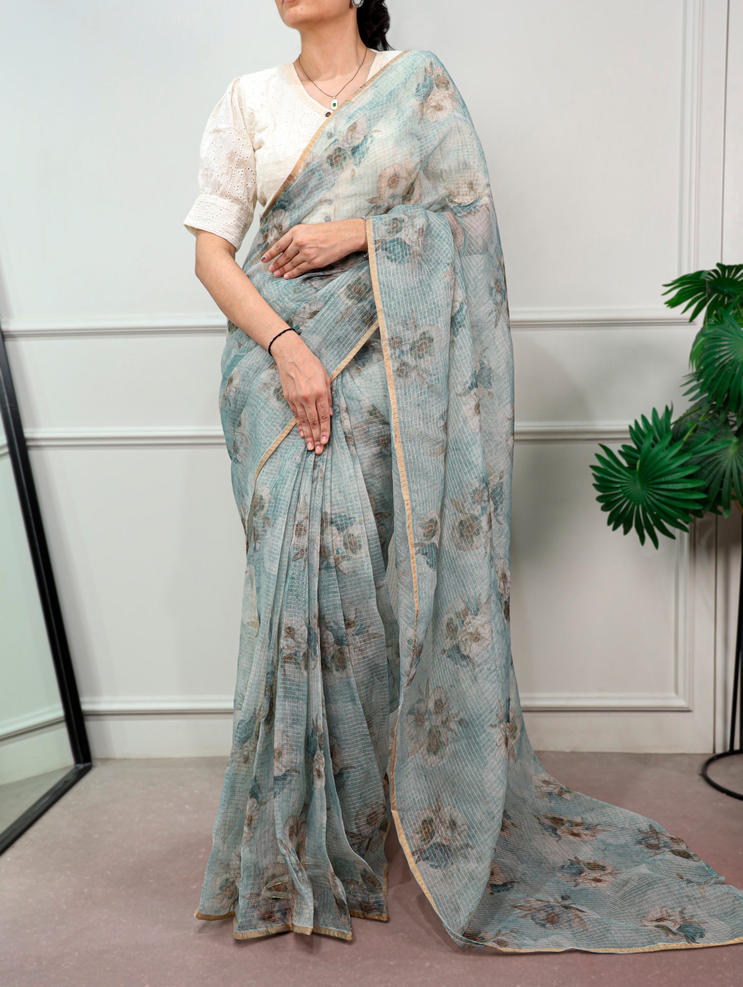 A Kota Doria saree designed to keep you stylish, confident, and graceful wherever you go.