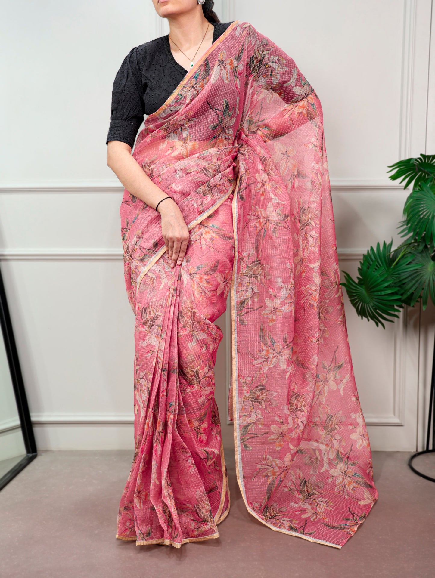 A Kota Doria saree designed to keep you stylish, confident, and graceful wherever you go.