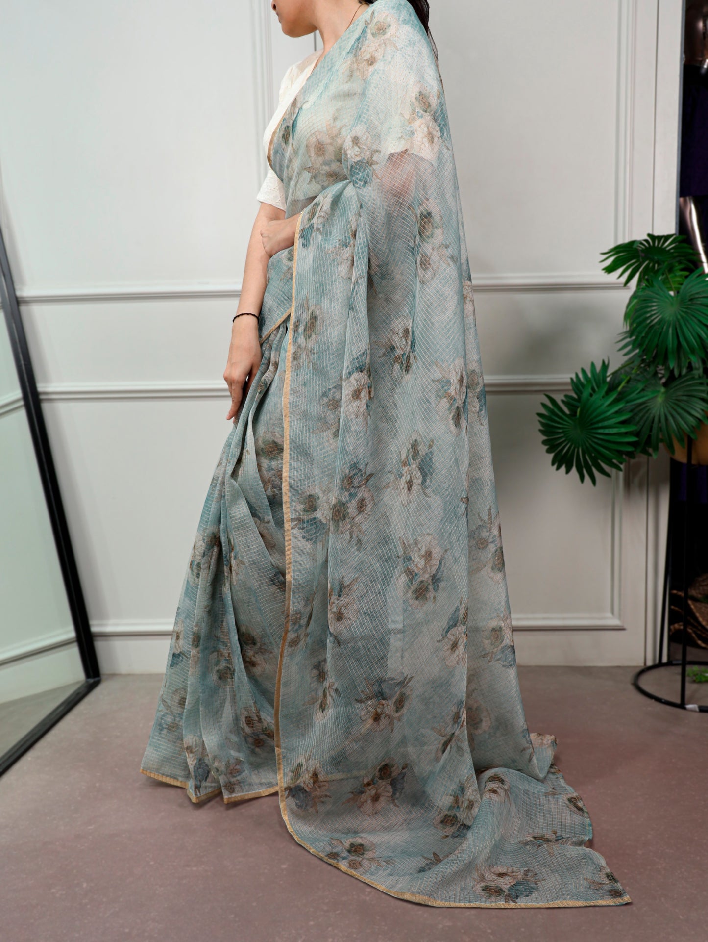 A Kota Doria saree designed to keep you stylish, confident, and graceful wherever you go.