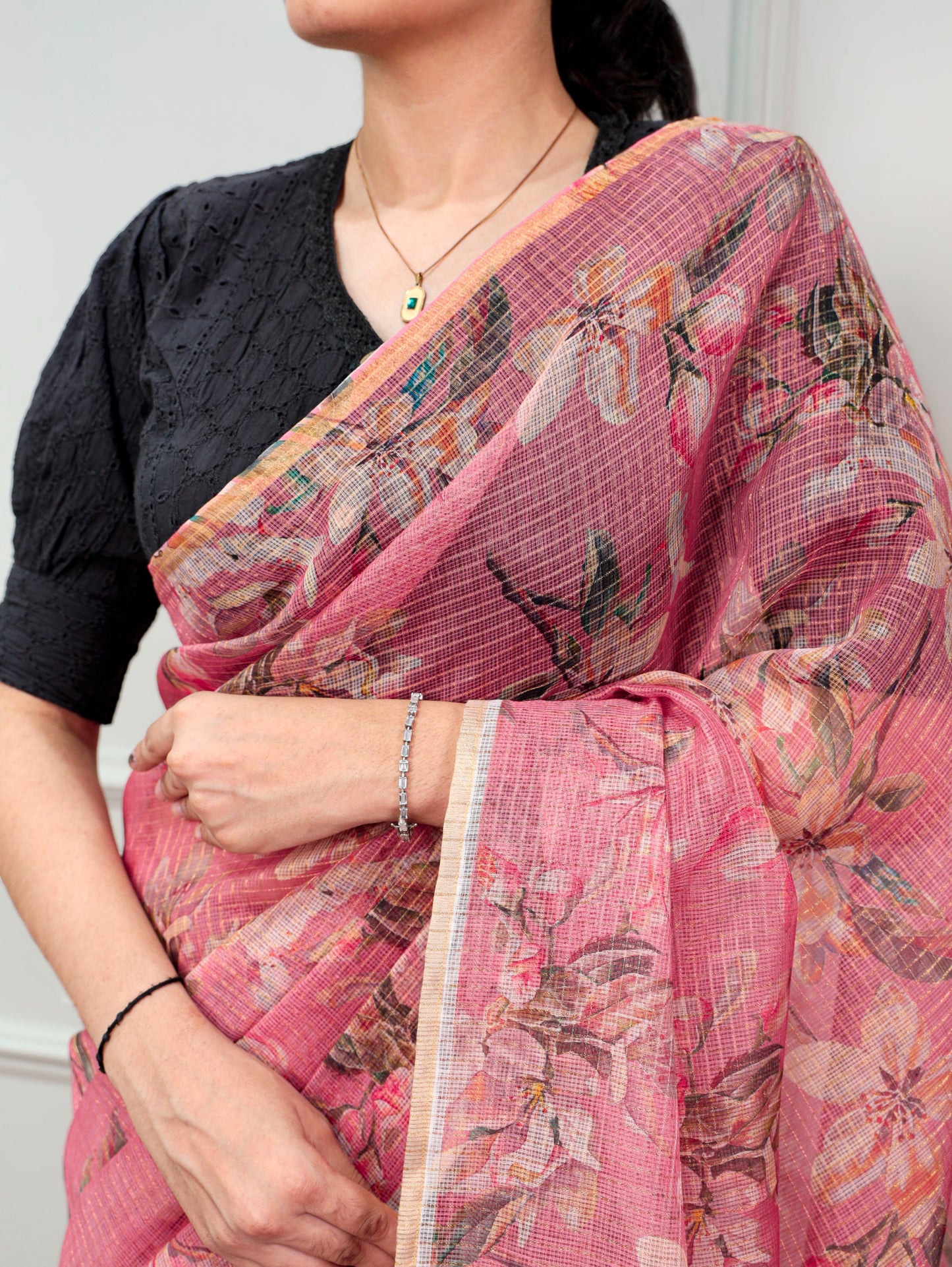A Kota Doria saree designed to keep you stylish, confident, and graceful wherever you go.