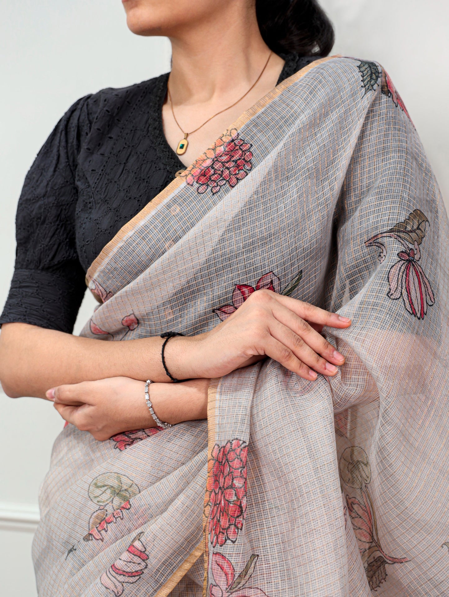 A Kota Doria saree designed to keep you stylish, confident, and graceful wherever you go.